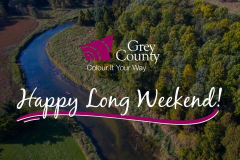 Grey County logo and happy long weekend text over aerial image