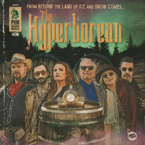 A group of people stand around a barrel. Resting atop the barrel are a bottle of whiskey and two glasses.