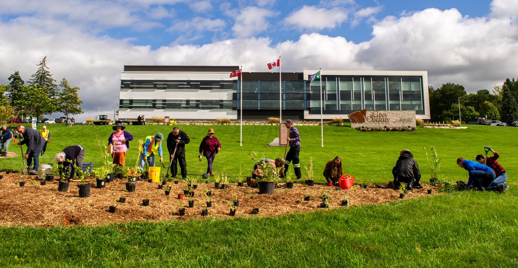 Volunteers planting trees and shrubs at the County Administration Building