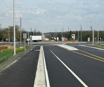 Roundabout Opens at Grey Roads 3 and 4 Improving Safety of Busy Intersection