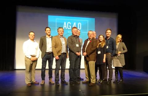 Apps for Ag Winners stand on stage with Grey County Warden Alan Barfoot and mentors from AgNition, Palmer Anderson, and Georgian College.