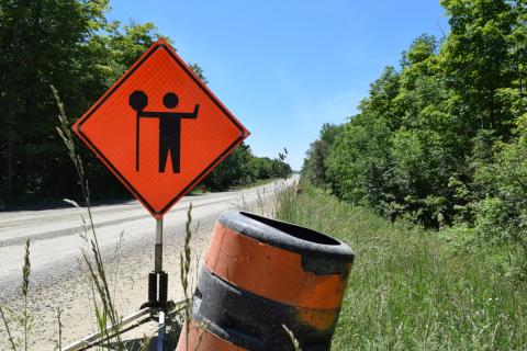 A road work ahead sign