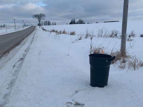 Garbage can properly positioned on the roadside for collection