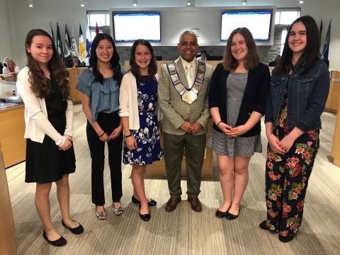 Warden Hicks with local science fair champions