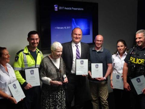 Paramedics, dispatchers, OPP officers and a bystander are reunited with the wife of a cardiac arrest patient they helped save.