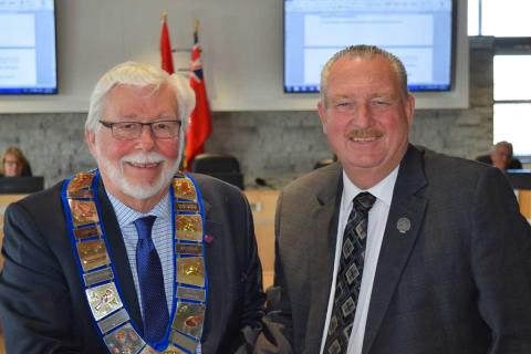 Warden Stewart Halliday stands beside Past warden Al Barfoot