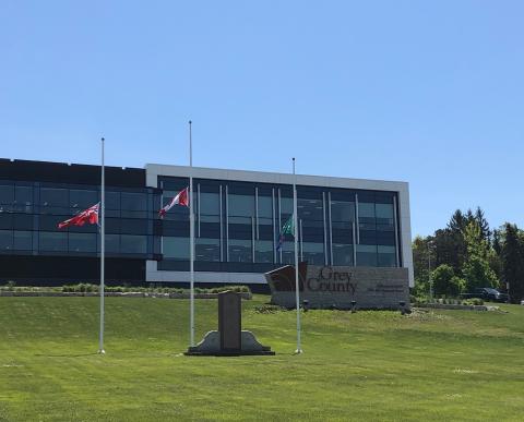 flags at Grey County administration building at half mast