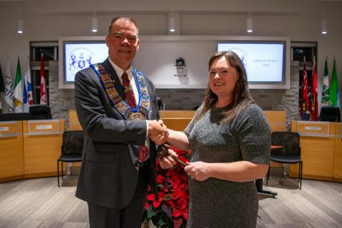 Grey County Warden Brian Milne (left) shakes hands with County Clerk Tara Warder following the Inaugural Session of Grey County Council on December 5, 2023.