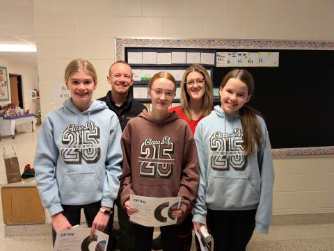 GIS Day contest winners. 1st place GIS Day Contest winners from left to right include: Madi J., Maddy B., and Leah F. from Holy Family School in Hanover. Second row is Bruce County’s GIS Specialist, Alex Flanagan and Holy Family School Teacher, Kayla Spielmacher.