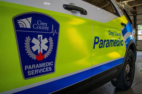 close up of the door of a Grey County paramedic services vehicle with the County service crest